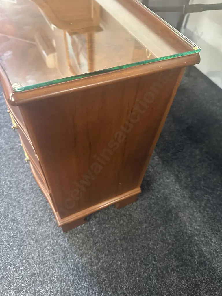 Pair Of Wooden Walnut Detailed Three Drawer Bedsides With Brass Ornate Handles & Glass Top. H62,W48,D34cm. Image 1++
