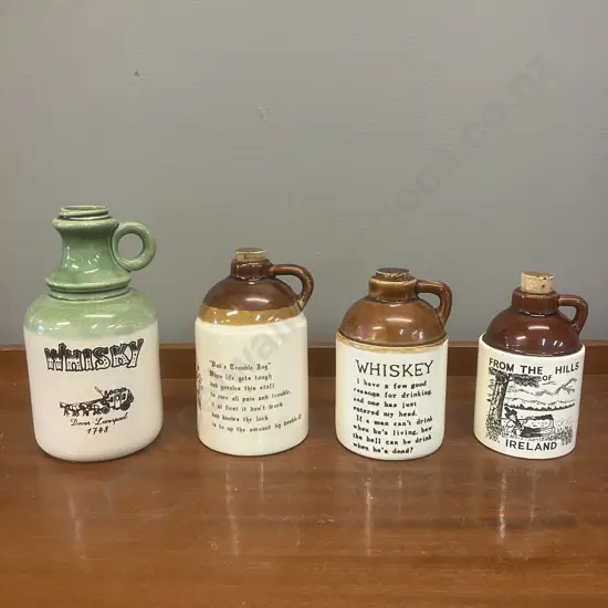 Lot of Four Whisky Jugs