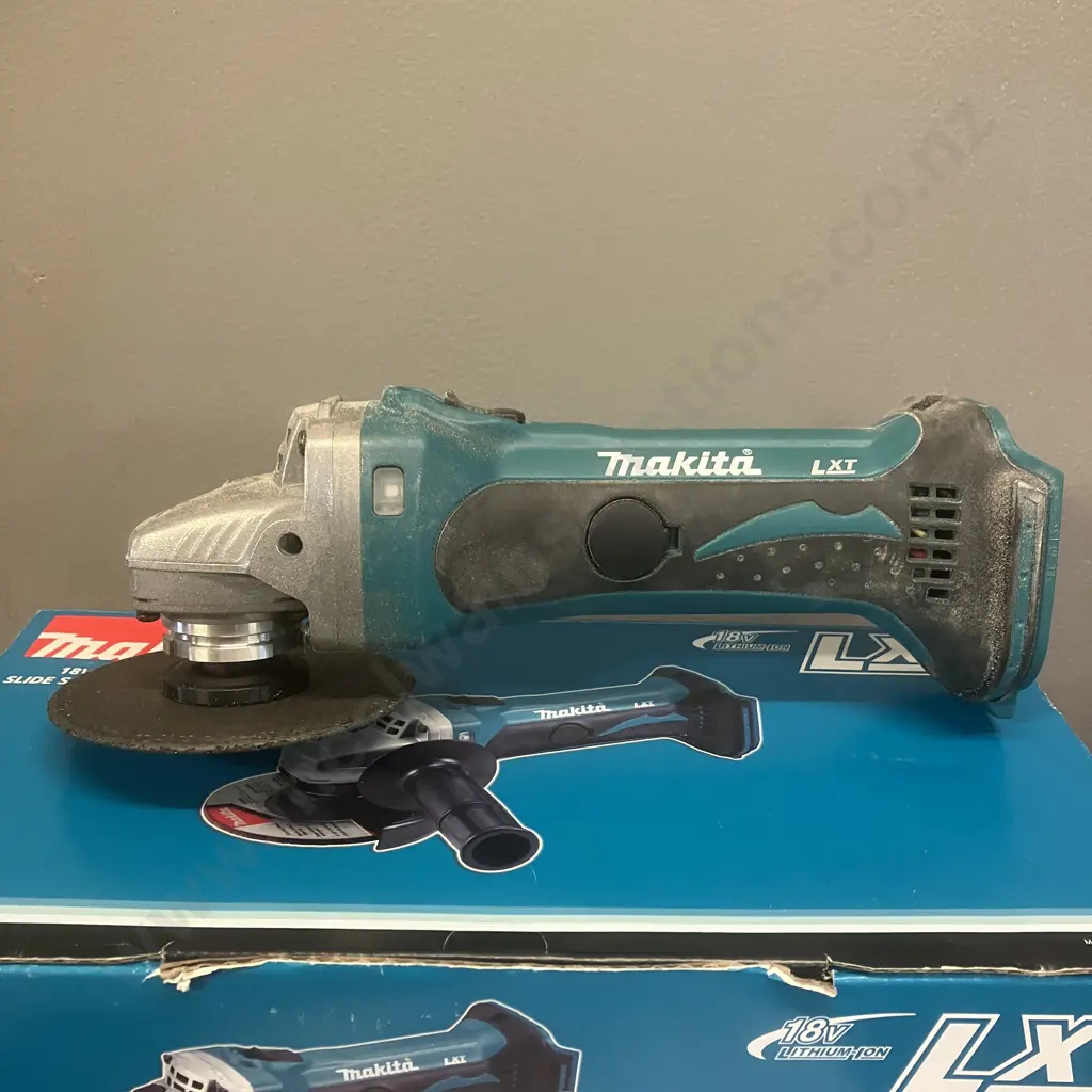 Makita 18V LXT 115mm (4-1/2") Slide Switch Angle Grinder Skin Only - DGA452Z Image 1++