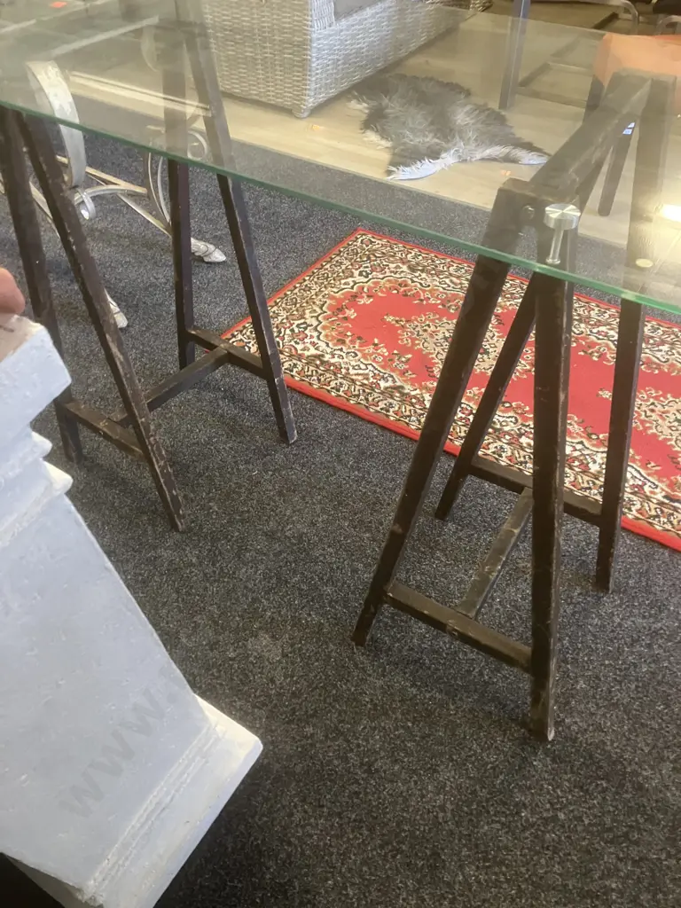 Glass Top Table On a Pair of Black Steel Trestles. H92.5 W140 D60cm Image 1++