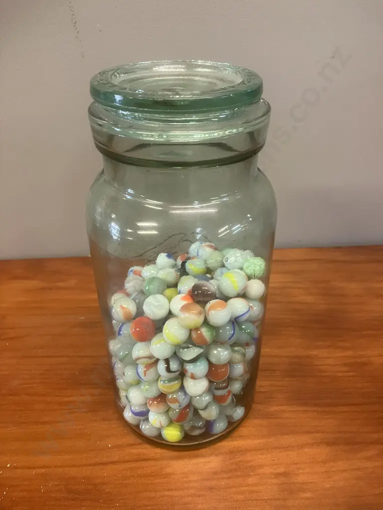 Glass Jar With Marbles Image 1++