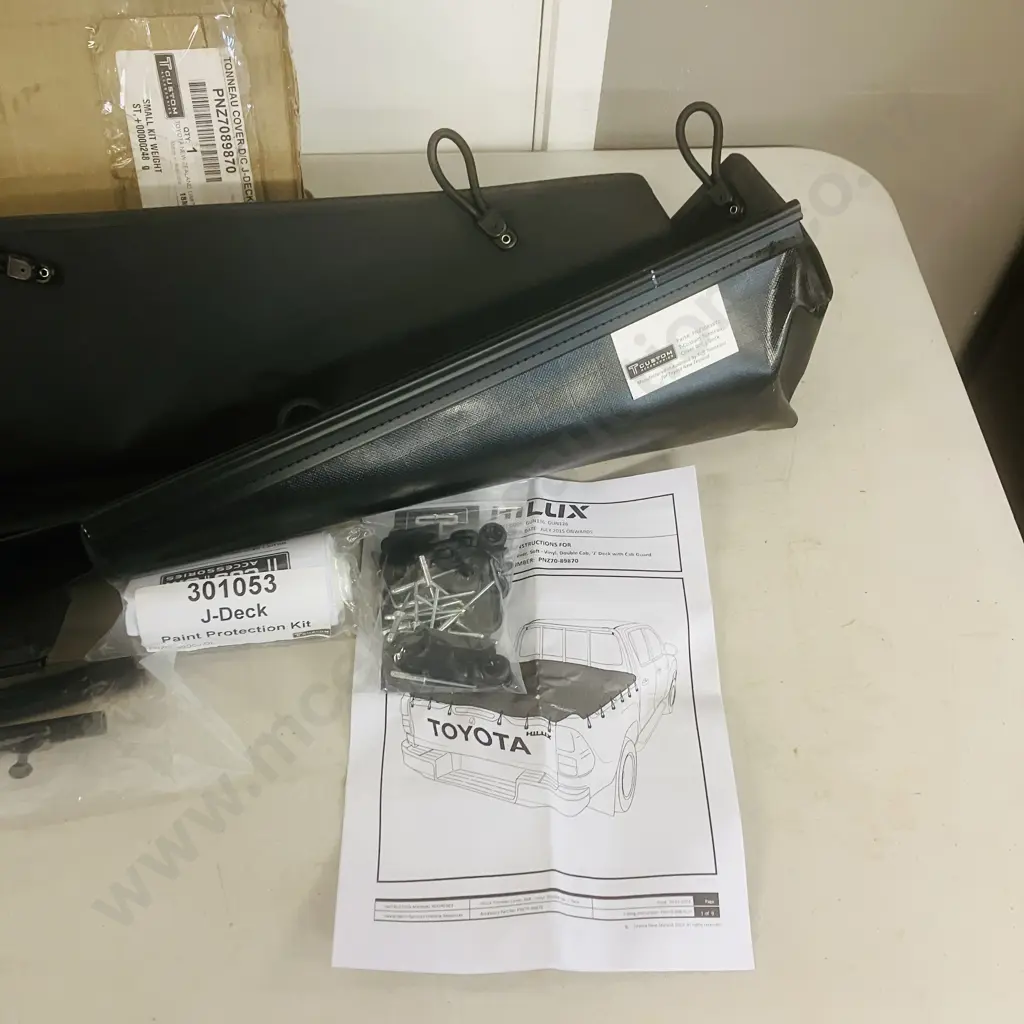 Toyota Hilux Tonneau Cover, Soft - Vinyl, Double Cab, "J" Deck With Cab Guard - Part Number PNZ7089870 Image 1++