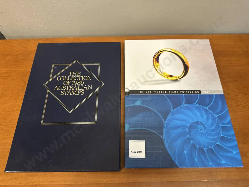 The NZ Stamp Collection 2002 & Collection Of Australian Stamps 1986 Image 1++