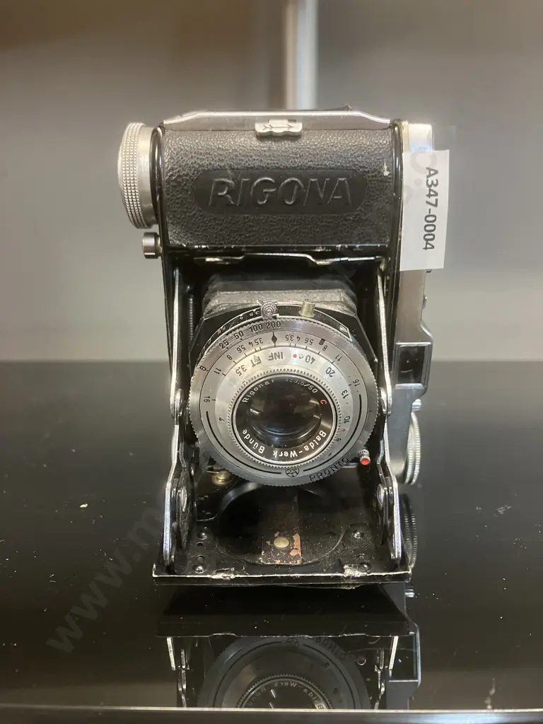 Balda Rigona; Balda-Werk Bünde; 1948-1955 Post War West Germany 35mm Rangefinder Folding Camera With a 50mm f3.5 Lens Image 1++