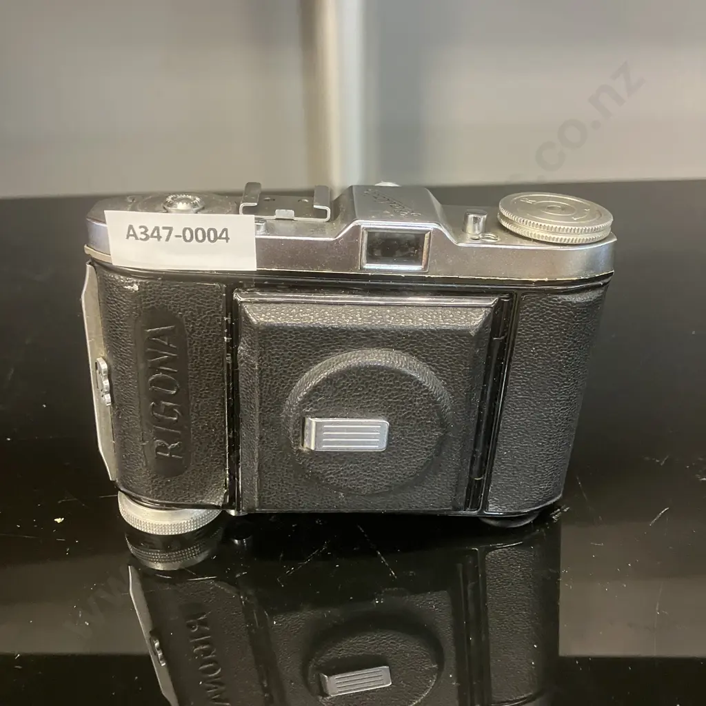 Balda Rigona; Balda-Werk Bünde; 1948-1955 Post War West Germany 35mm Rangefinder Folding Camera With a 50mm f3.5 Lens Image 1++