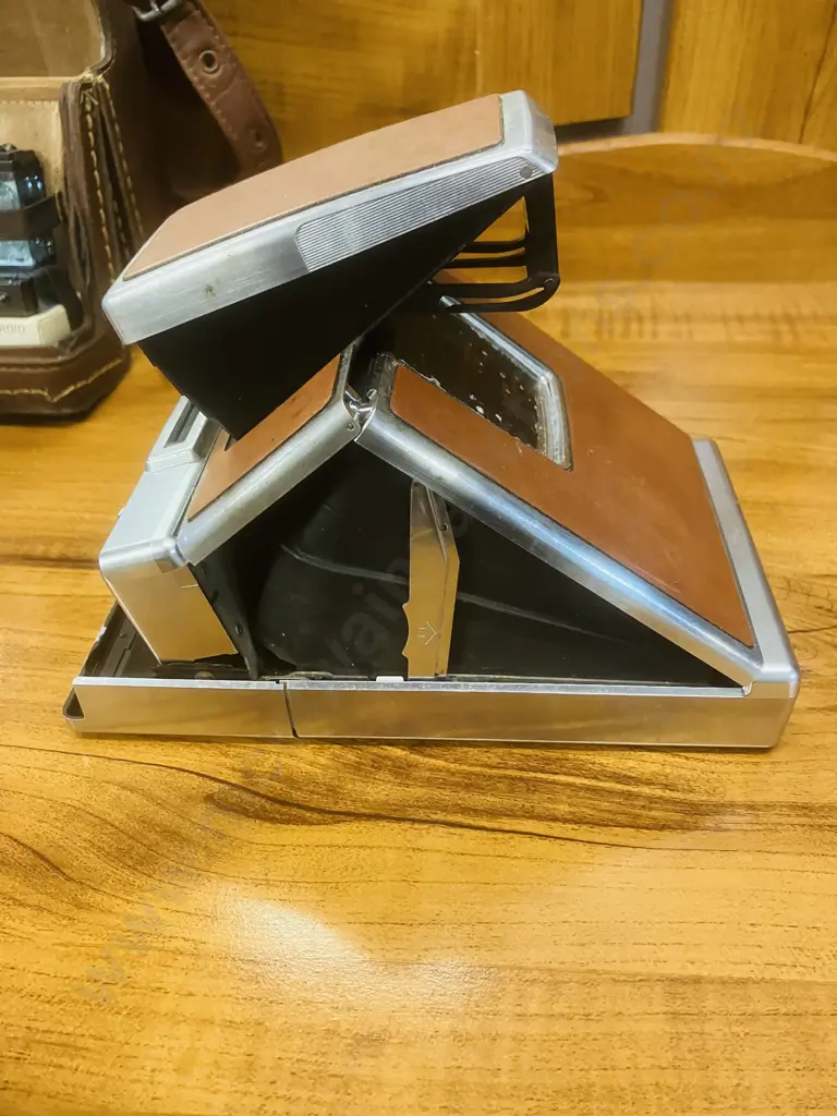 Vintage 1970’s Polaroid SX-70 Land Camera With Leather Case, Flash Bars, Tripod Mount Etc Image 1++