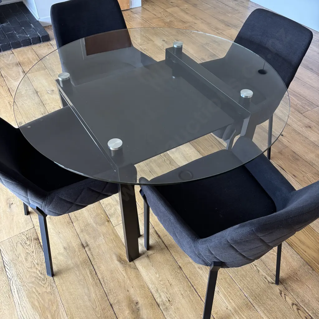 Round Clear Glass Table With Black Undershelf, Black Powder Coated Base 75x120cm & 4 Charcoal Luna Carver Dining Chairs Image 1++