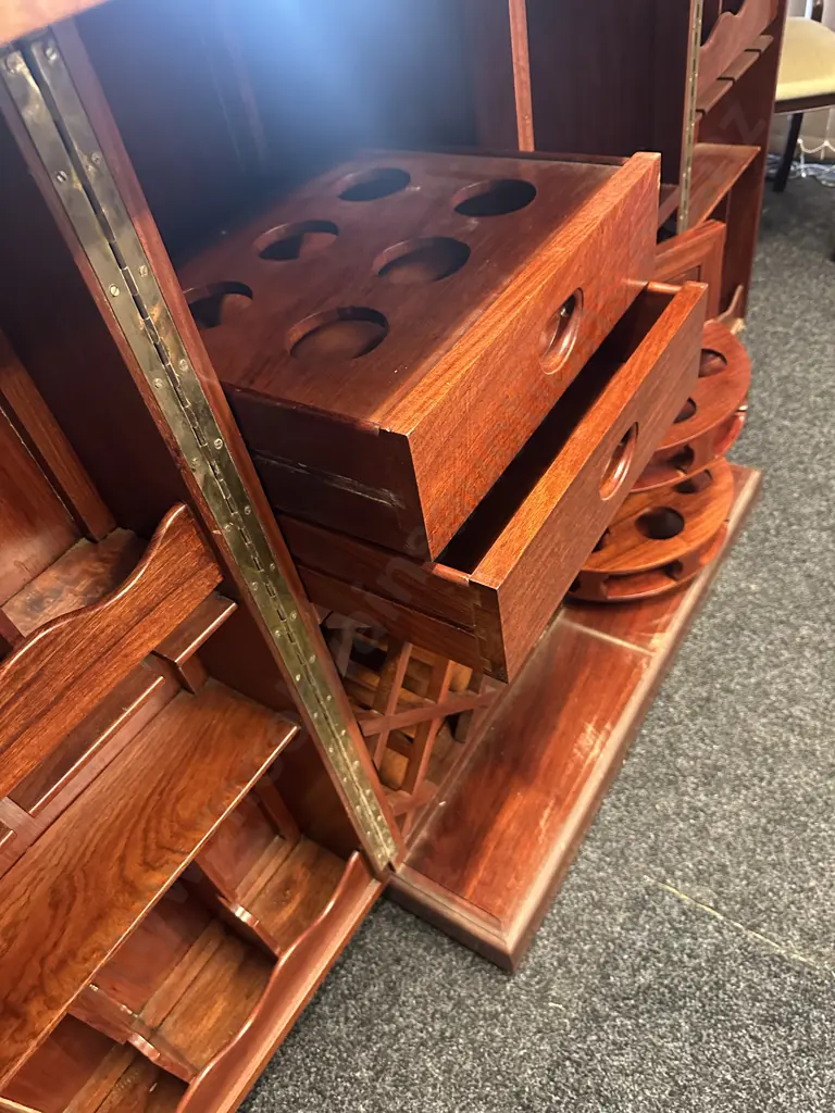 Rosewood Metamorphic Rolling Bar Cabinet H108,W92.D57cm. Opened H105,W183,D57cm. Image 1++