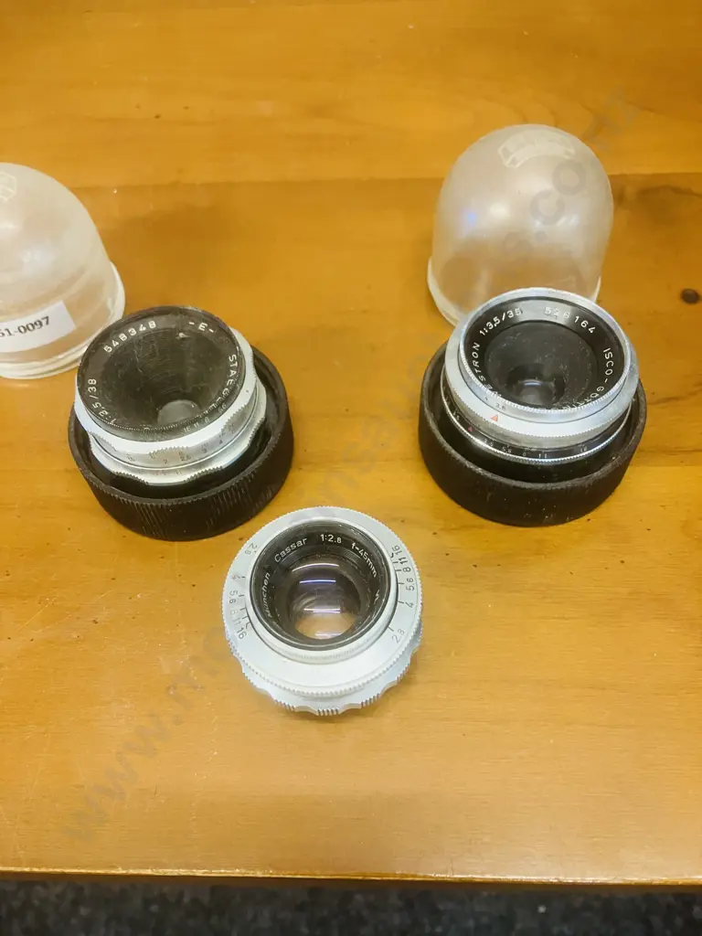 Lenses - Isco-Gottingen Westron 1:3.5/35, Staeble-Choro 1:3.5/38, Steinheil Munchen Cassar 1:2.8/45 Pair of Lens Bubbles Image 1++