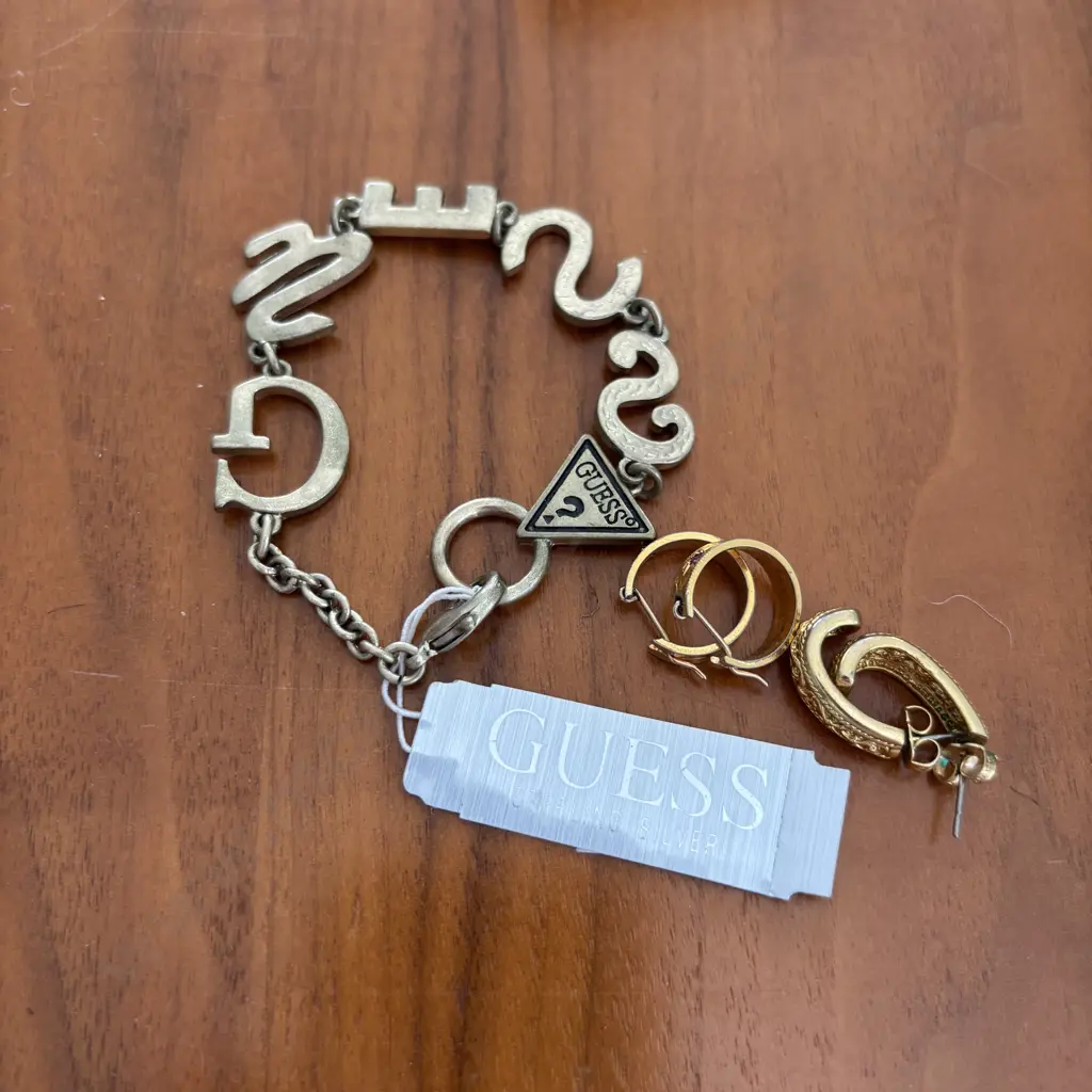 Guess Bracelet with two pair stamped (unreadable) Gold coloured earrings  Image 1++
