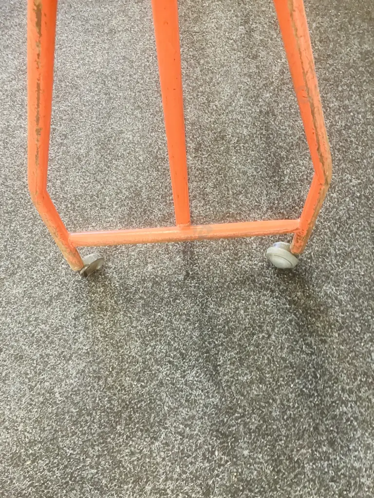 Steel Single Rail Garment Rack Painted Orange With Chrome Top Rail, On Castors (1 Wheel Damaged). H153 W157 D44cm Image 1++