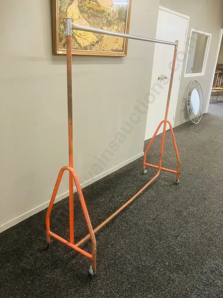 Steel Single Rail Garment Rack Painted Orange With Chrome Top Rail, On Castors (1 Wheel Damaged). H153 W157 D44cm Image 1++