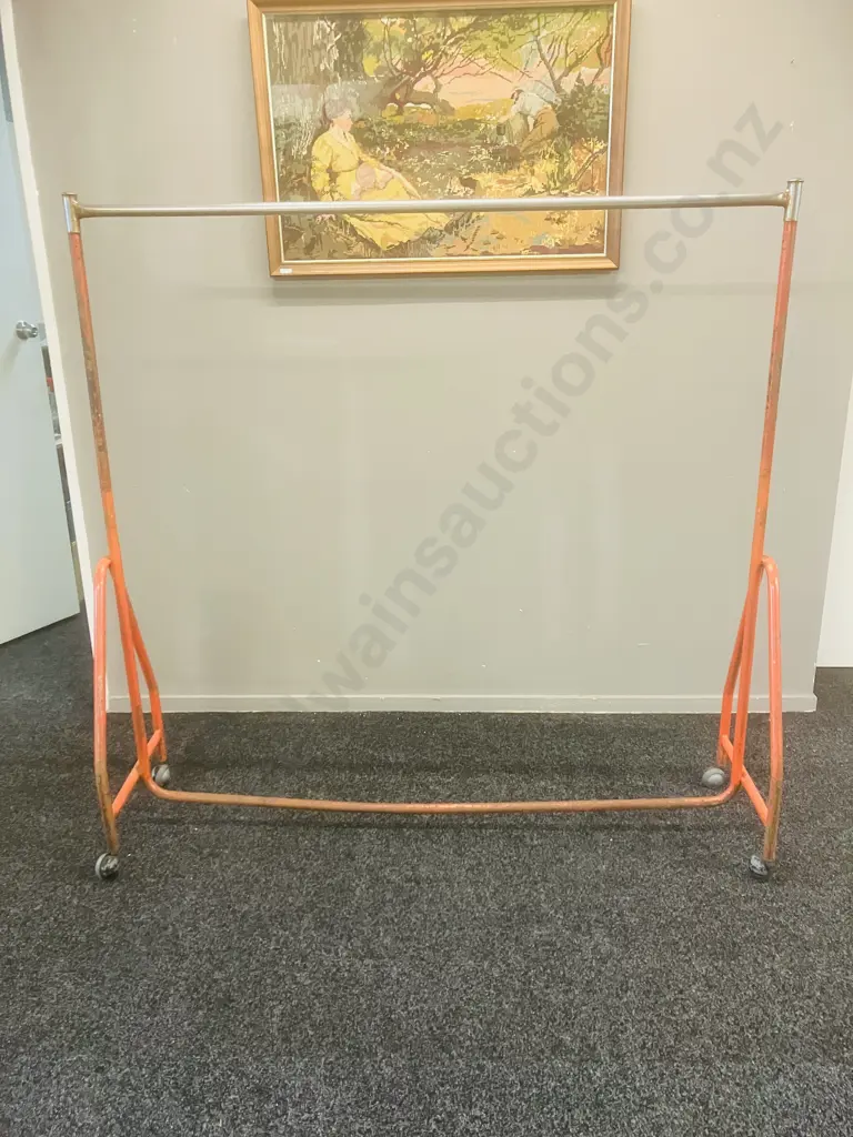 Steel Single Rail Garment Rack Painted Orange With Chrome Top Rail, On Castors (1 Wheel Damaged). H153 W157 D44cm Image 1++