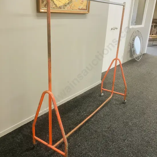 Steel Single Rail Garment Rack Painted Orange With Chrome Top Rail, On Castors (1 Wheel Damaged). H153 W157 D44cm