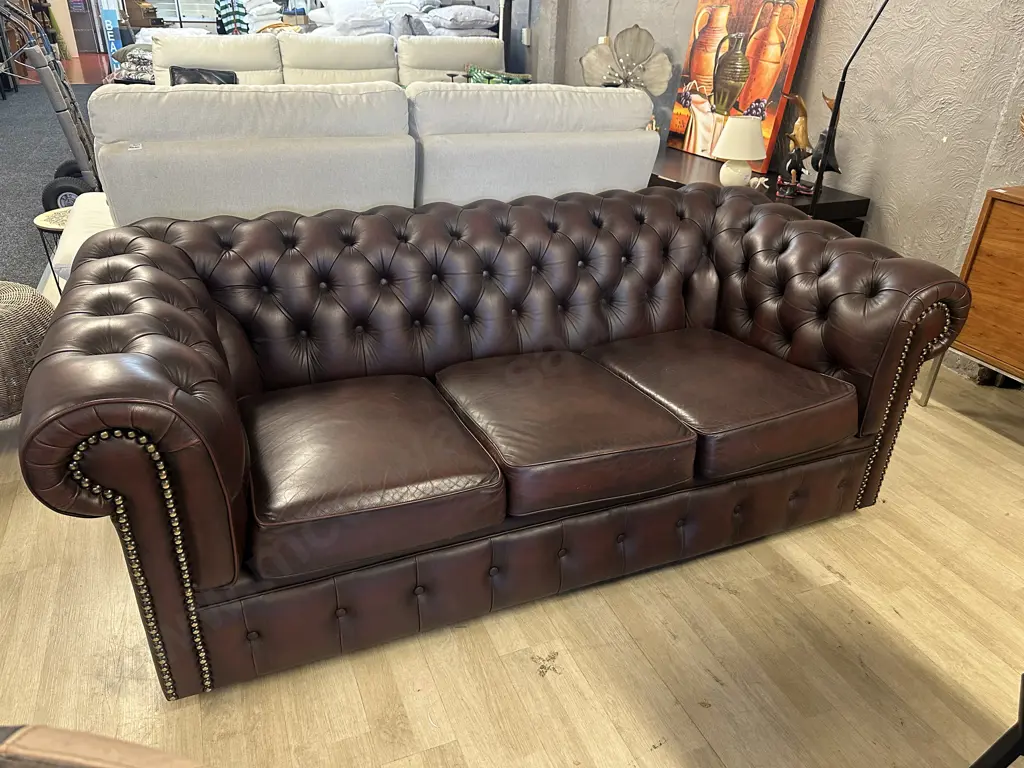 Moran Leather Burgundy Three Seater Chesterfield Sofa Button Back, Rolled Armed With Dome Detail H75,W185,D90cm. Image 1++