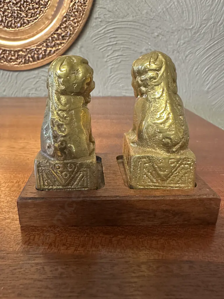 Pair Of Vintage Solid Brass Foo Dog Figurines On Wooden Plinth Image 1++