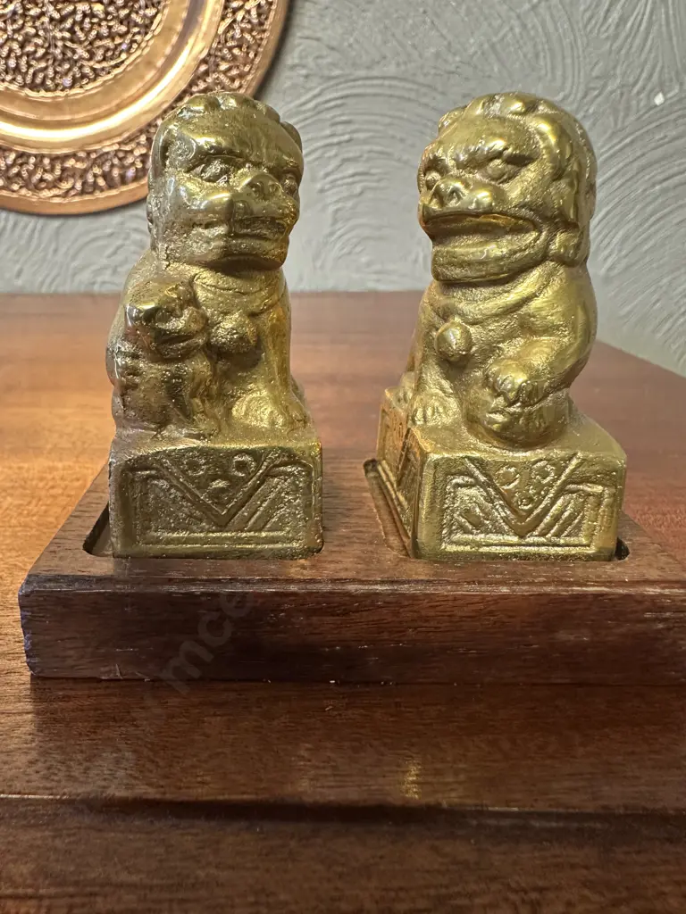 Pair Of Vintage Solid Brass Foo Dog Figurines On Wooden Plinth Image 1++