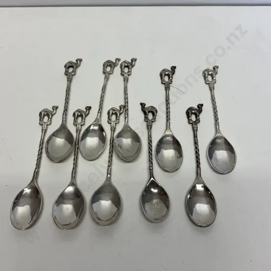 Set of 10 teaspoons with camel finials. 5 stamped as shown