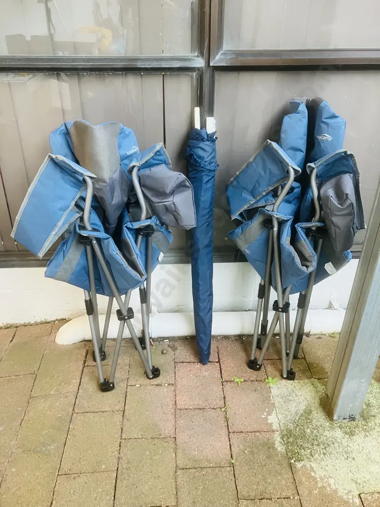 Pair of Basecamp by Kathmandu Camping Chairs With Blue Beach Umbrella Image 1++