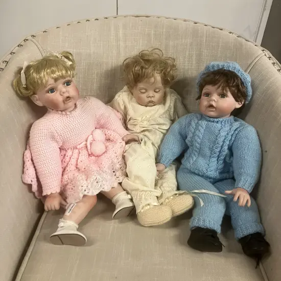 Three Porcelain Dolls