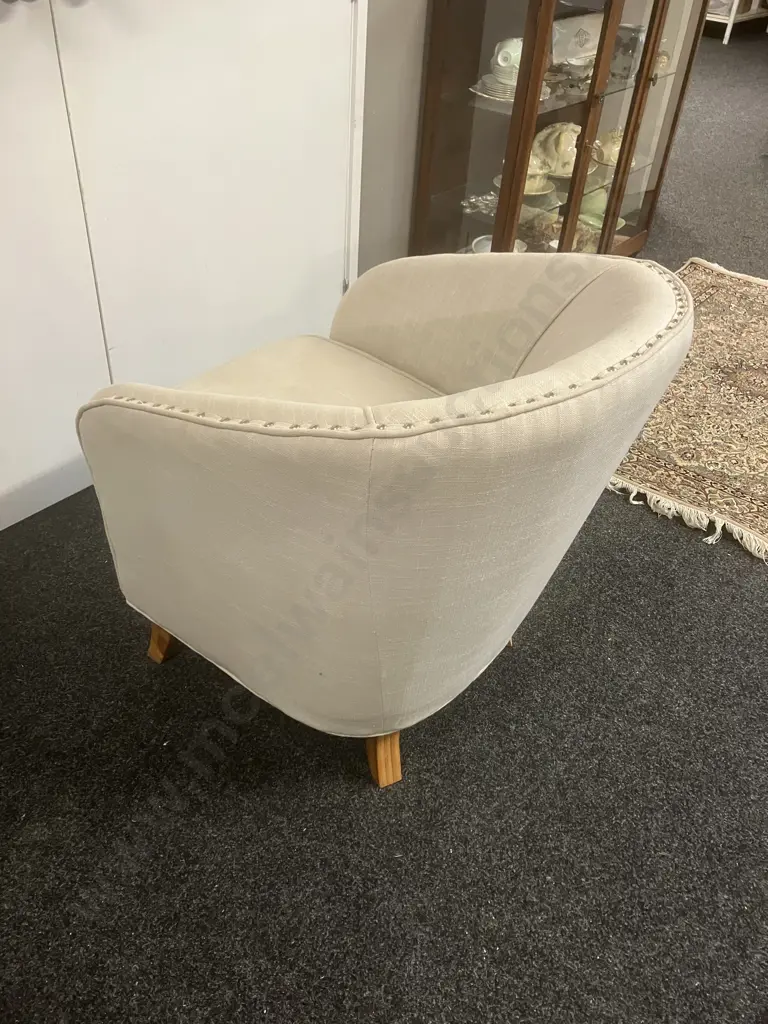 Cream Fabric Tub Chair On Four Wooden Legs, Domed Detailing. H82 W73 D81cm Image 1++