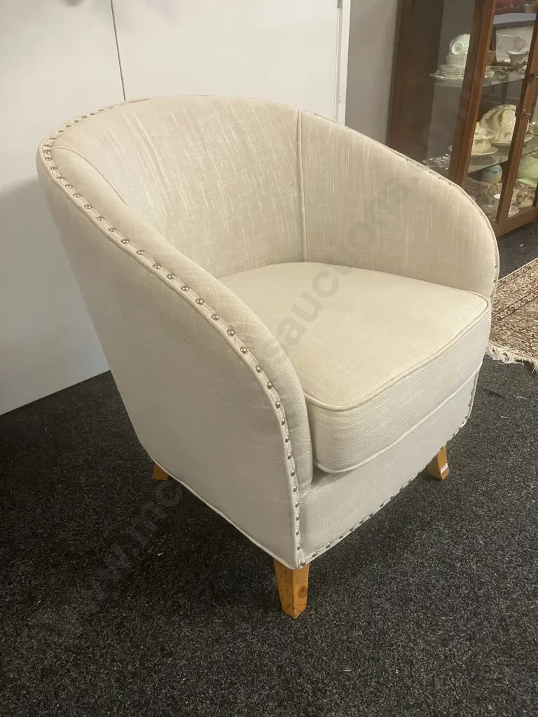 Cream Fabric Tub Chair On Four Wooden Legs, Domed Detailing. H82 W73 D81cm Image 1++
