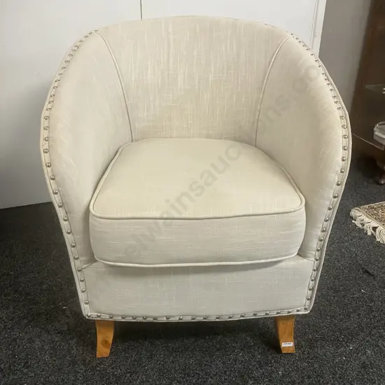 Cream Fabric Tub Chair On Four Wooden Legs, Domed Detailing. H82 W73 D81cm