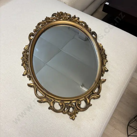 Antique Oval wooden carved Mirror. Gilded decorative frame. 67 x 44cm
