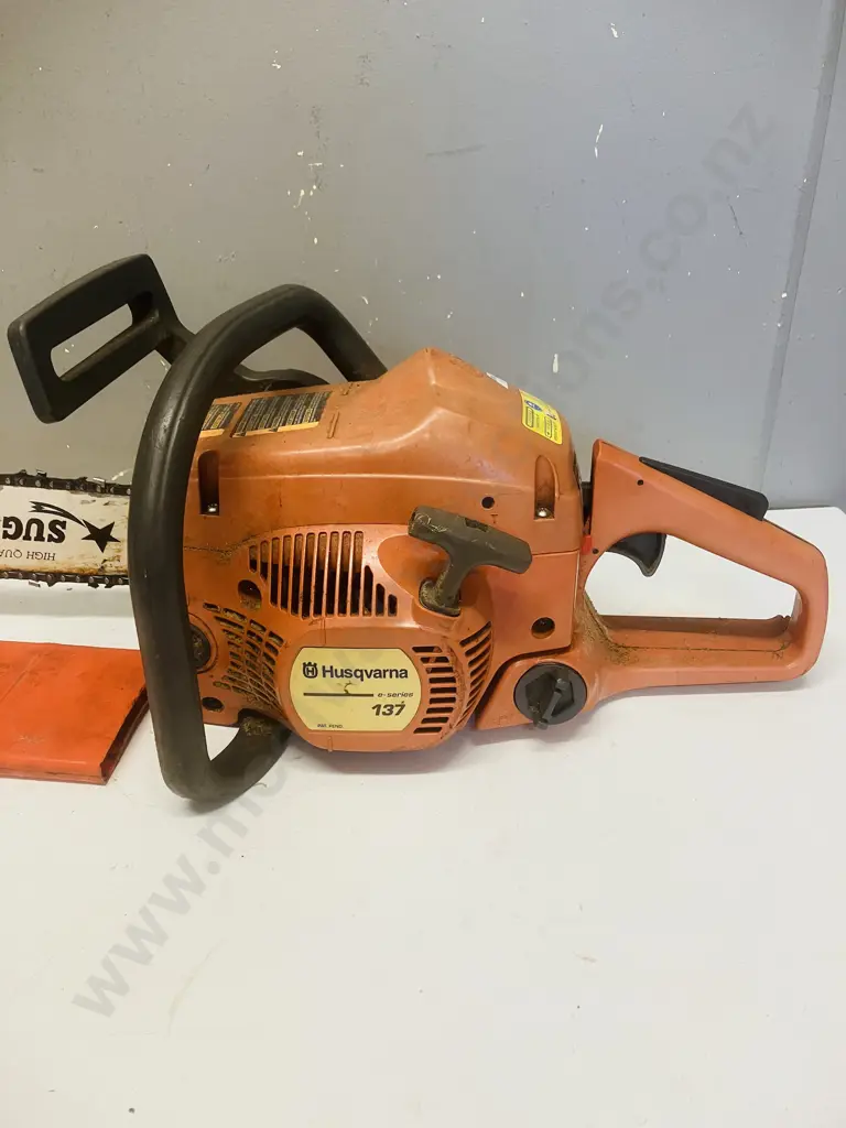 Husqvarna 137 E-Series Chainsaw Image 1++
