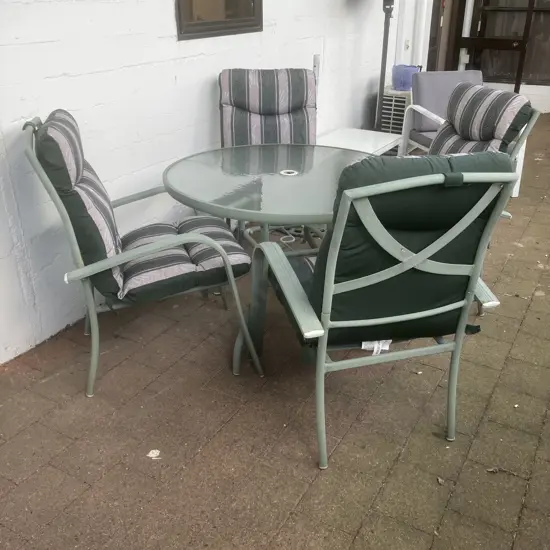 Outdoor Green Round Glass Topped table (70 x 100cm) With Four Chairs With Squabs