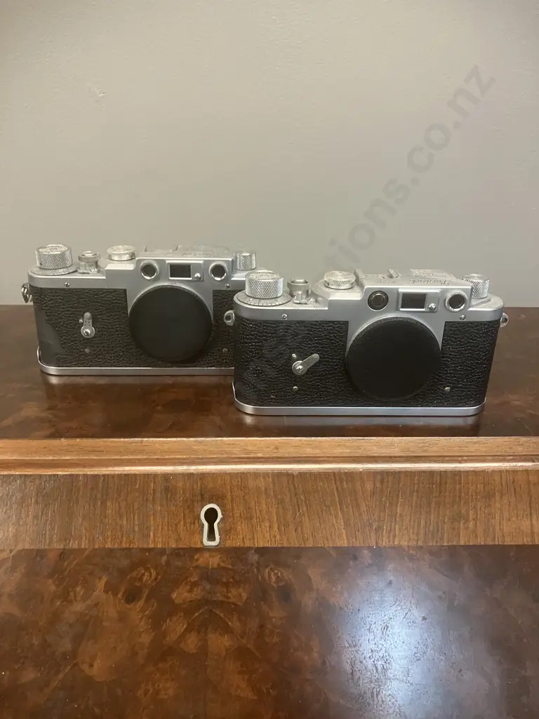 Leotax Model K (Japanese Leica Copy) Camera's #27908 & #27030 1955 Japan (One AF) Image 1++
