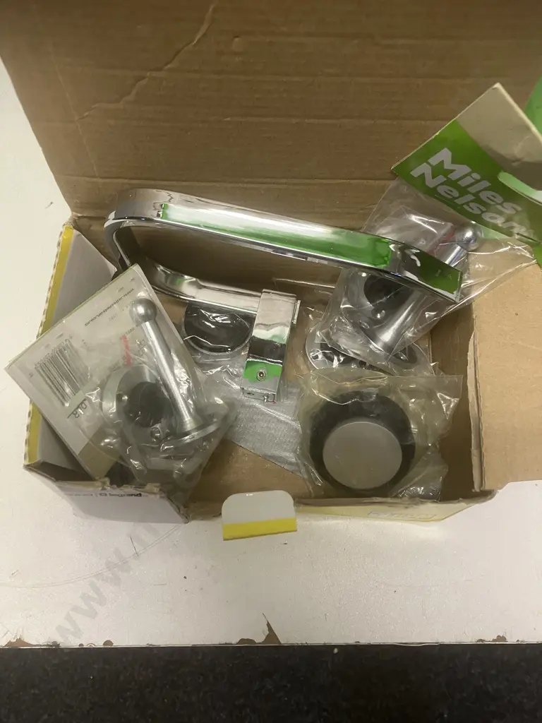 Small Green Bin With Assorted House Hardware Items Image 1++