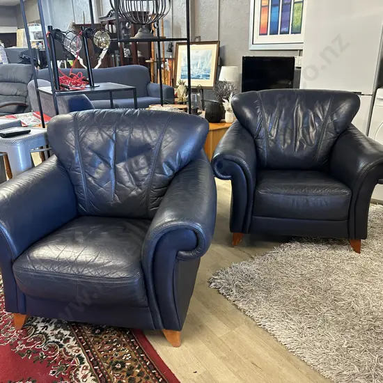 Pair Of Navy Leather Armchairs Rolled Arm Wooden Feet