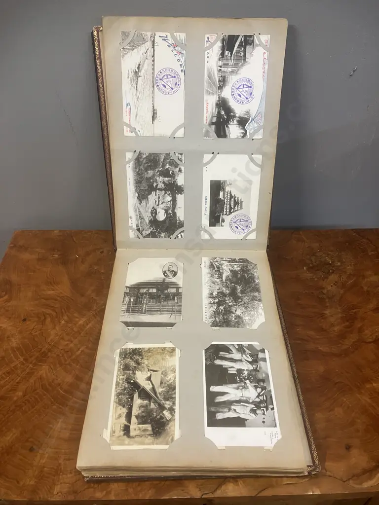 A Stunning Collection of 238 Early 1900's Postcards In A Black Lacquer Japanese Accordion Album Image 1++