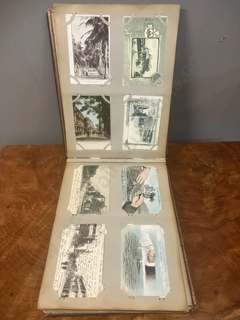 A Stunning Collection of 238 Early 1900's Postcards In A Black Lacquer Japanese Accordion Album Image 1++