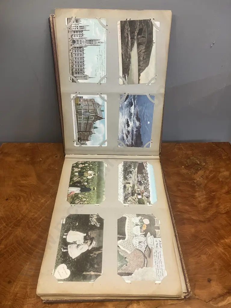 A Stunning Collection of 238 Early 1900's Postcards In A Black Lacquer Japanese Accordion Album Image 1++