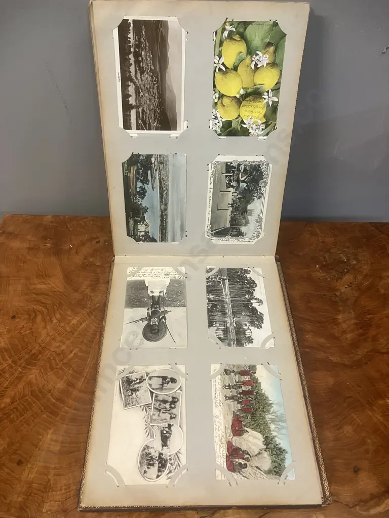 A Stunning Collection of 238 Early 1900's Postcards In A Black Lacquer Japanese Accordion Album Image 1++