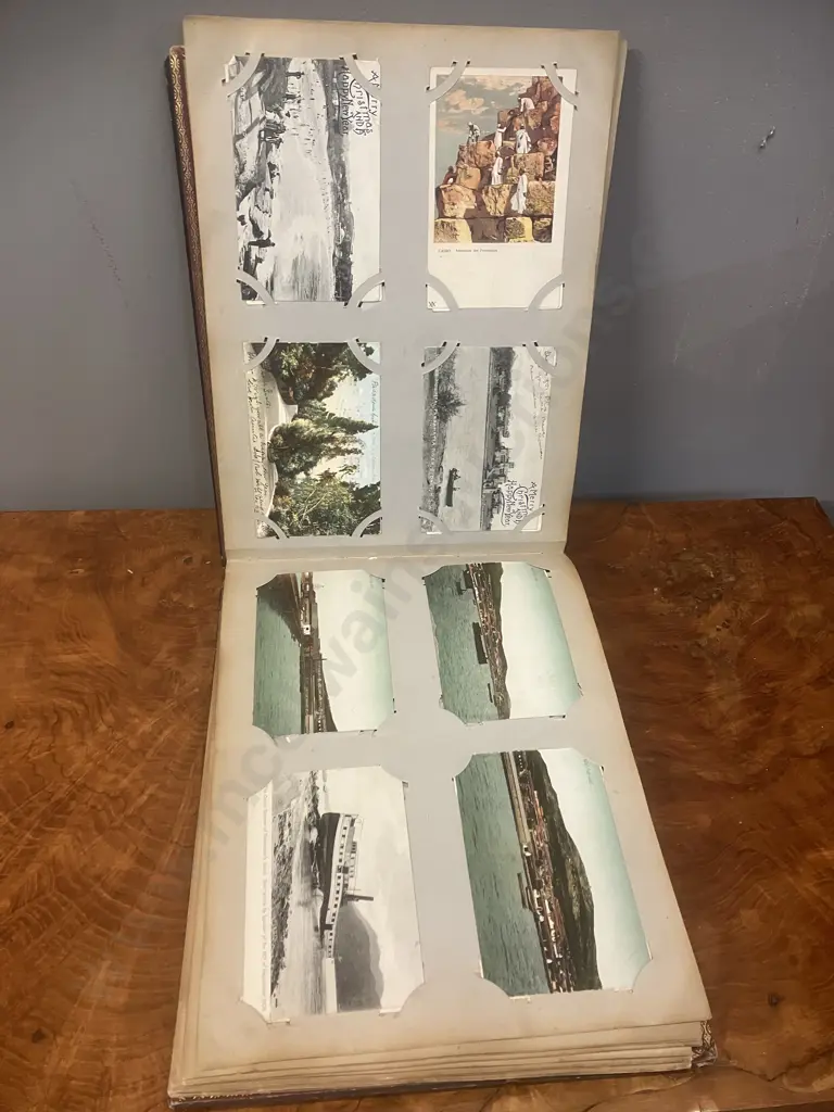 A Stunning Collection of 238 Early 1900's Postcards In A Black Lacquer Japanese Accordion Album Image 1++