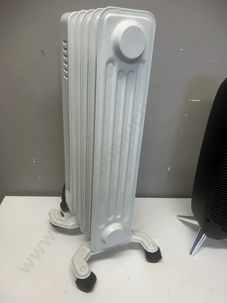 Mistral 2000W Retro Ceramic Tower Heater & Necessities 1000W Oil Fin Heater Image 1++