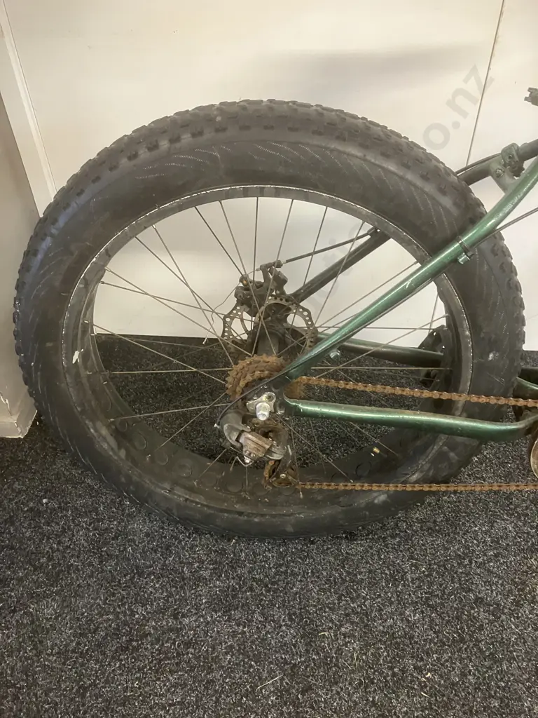 Green Bike With Large Rear Tyre Image 1++