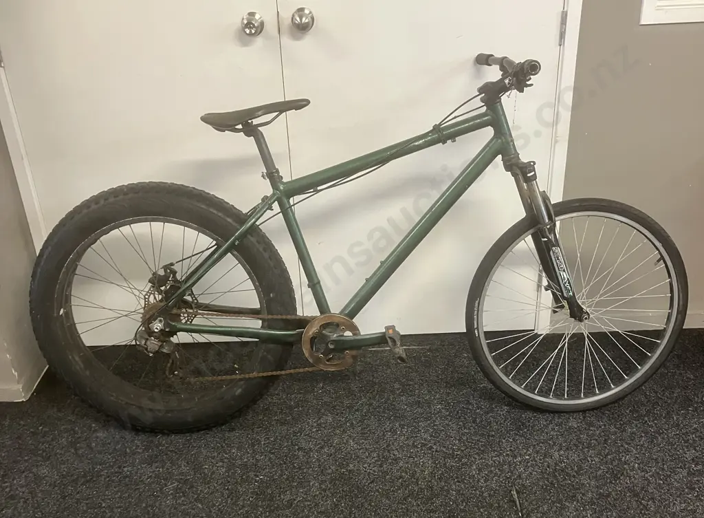 Green Bike With Large Rear Tyre Image 1++