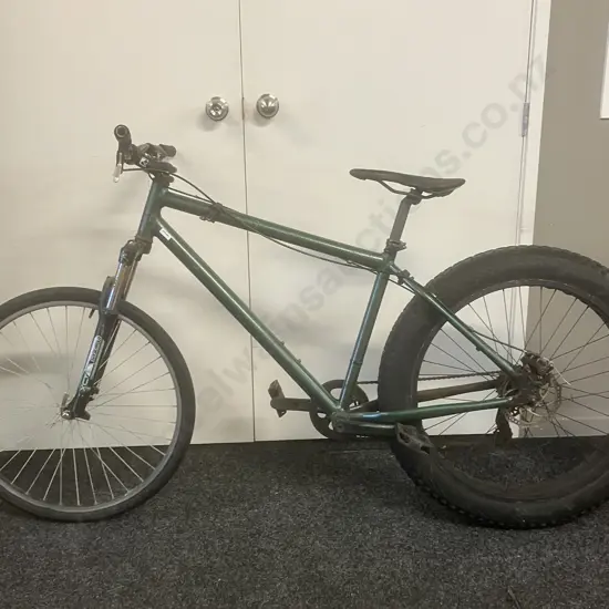 Green Bike With Large Rear Tyre