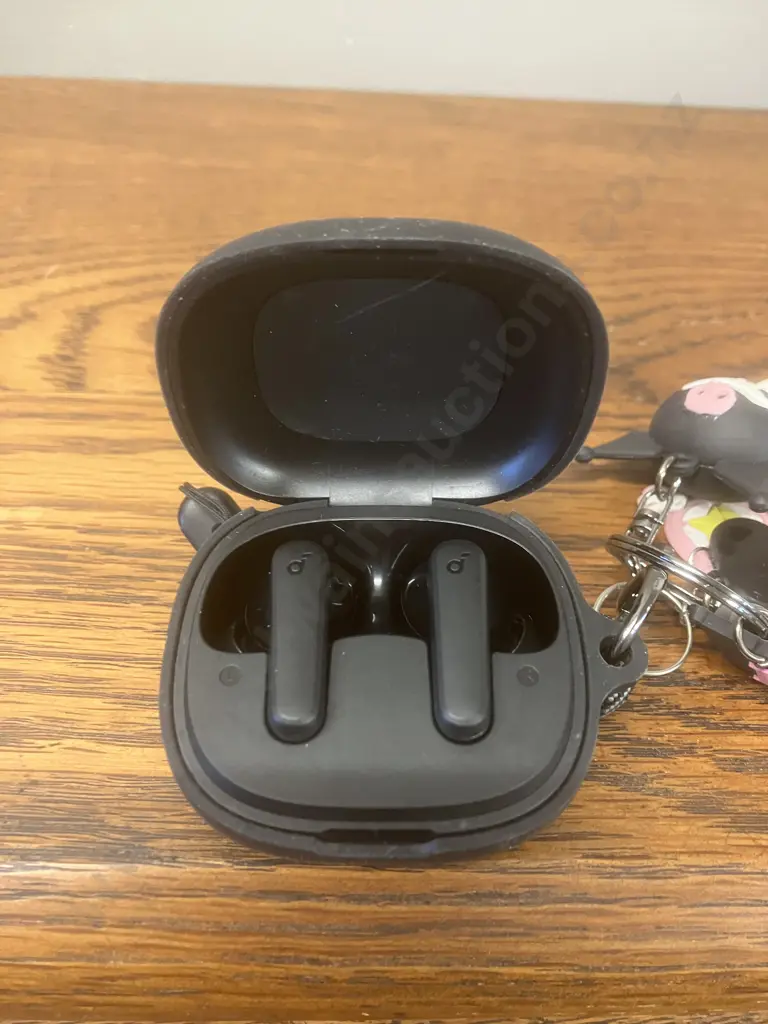 Anker Soundcore Wireless Earbuds With a Sanrio Kurimo Soft Silicone Case With Keychain Image 1++