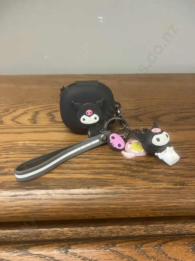 Anker Soundcore Wireless Earbuds With a Sanrio Kurimo Soft Silicone Case With Keychain Image 1++