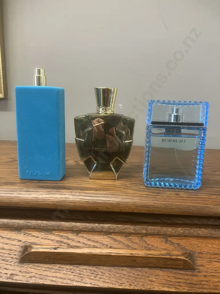 NUSUK WAA Turquoise EDP Spray, Versace Man Eau Fraiche EDT 100ml & Oud Khaleeji Legend EDP - Part Bottles Image 1++