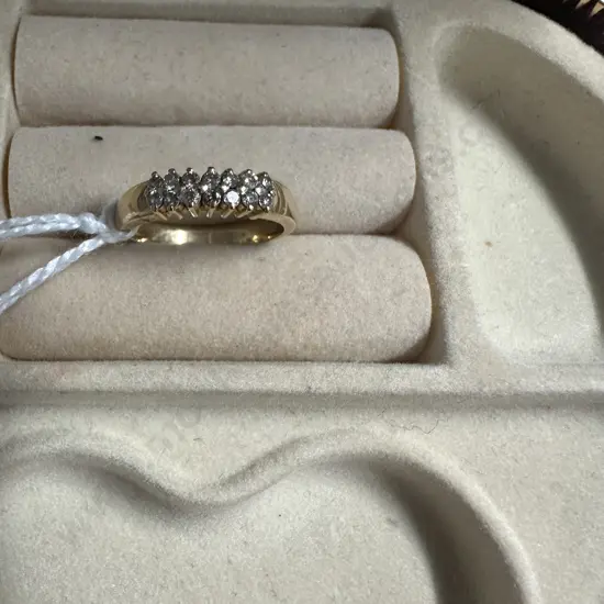 Gold Coloured Ring With 14 Clear Stones