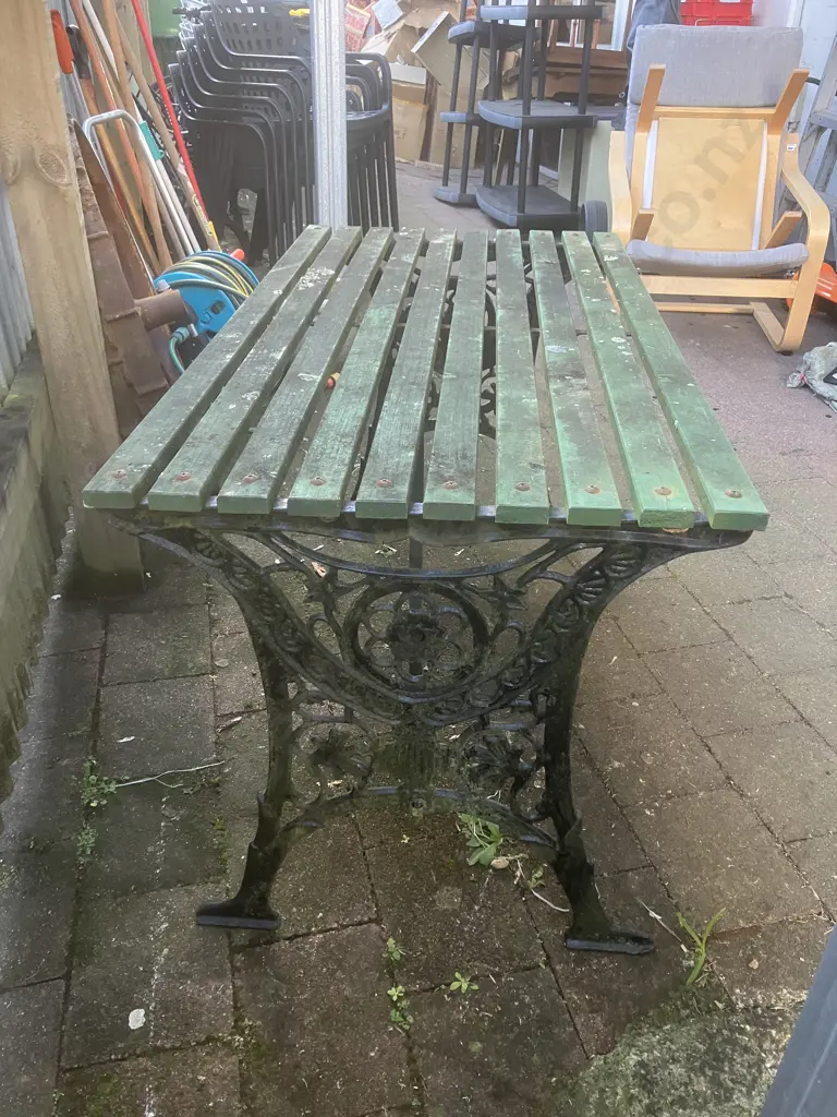 Black Steel Garden Table With Green Painted Wooden Slats. H64 W120 D62cm Image 1++