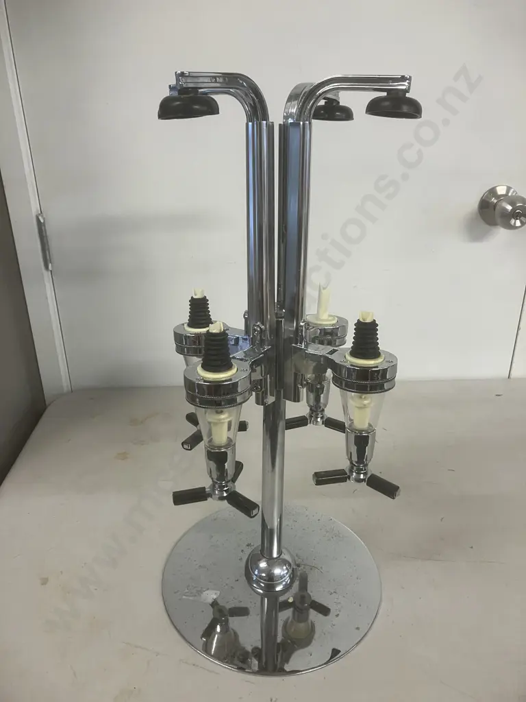 Four Bottle Revolving Spirits Dispenser Image 1++