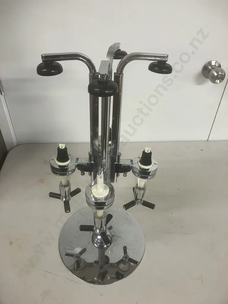 Four Bottle Revolving Spirits Dispenser Image 1++