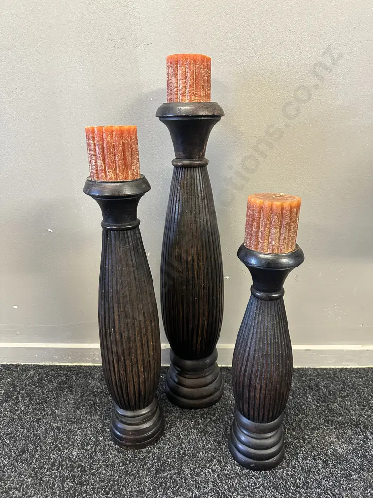 Set Of Three Wooden Candle Holders & Rust Coloured Candles Graduated Sizes 48-68cm. Image 1++